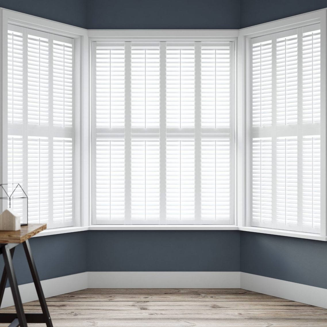 Bay Window Plantation Shutters – Chester White full height plantation shutters fitted to a bay window in a Chester home